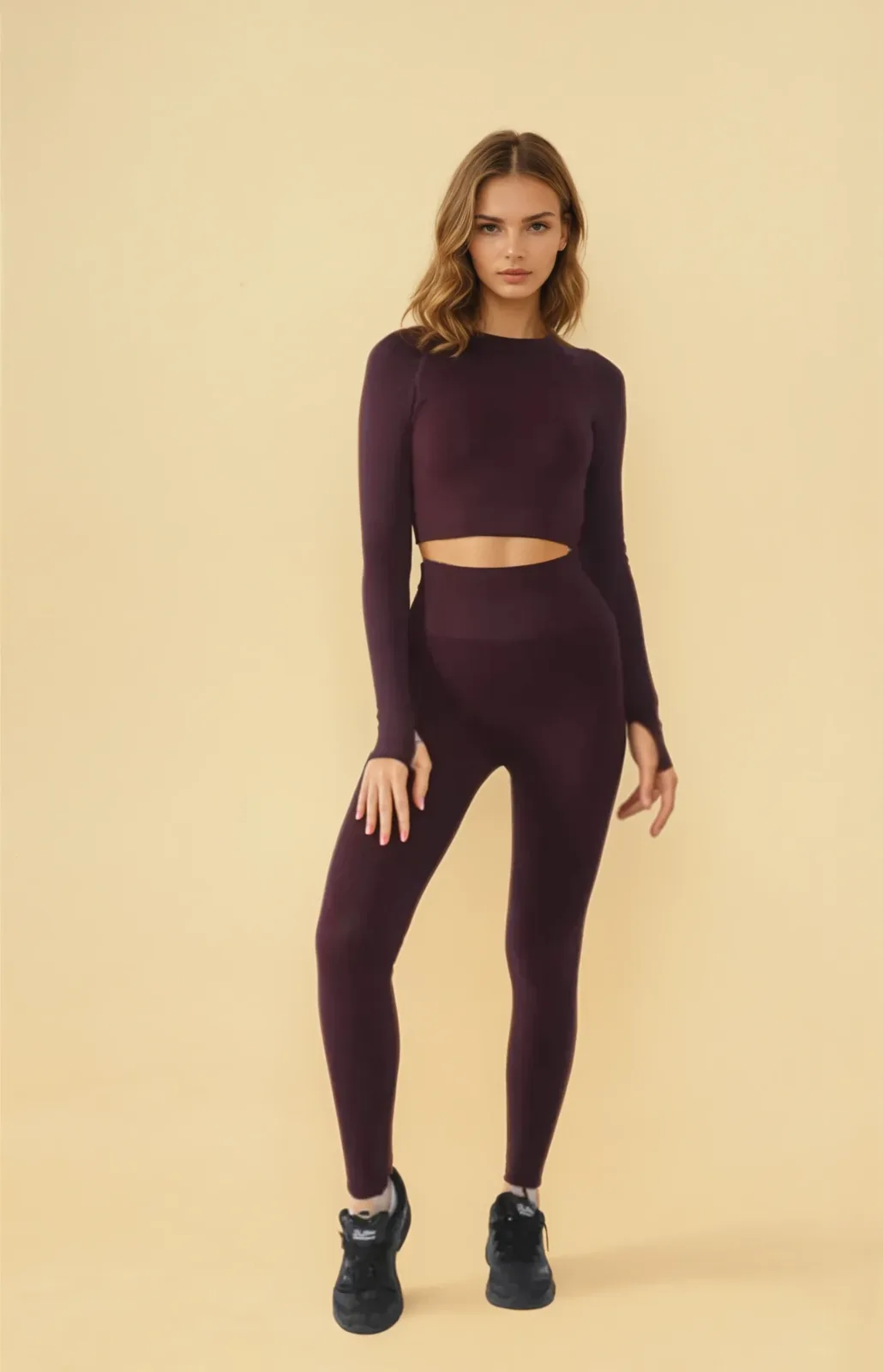 Model wearing an Overfit Seamless burgundy set